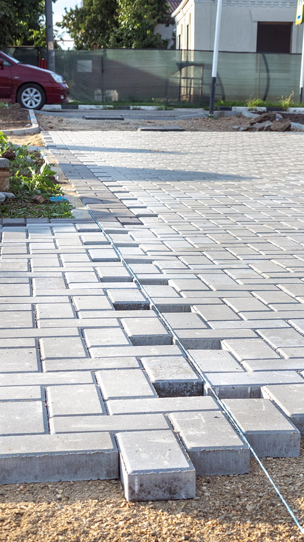 Durable paver driveway installation in Avenel, New Jersey by Northeastern PMC