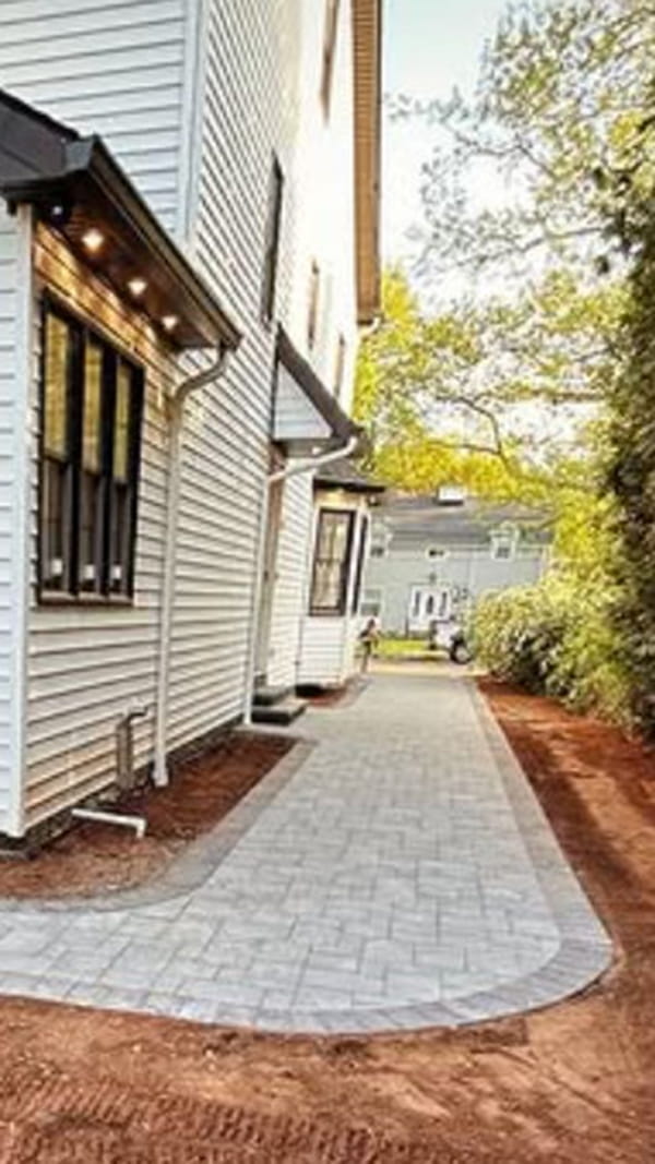 Custom-designed paver pathways installed in Woodbridge, New Jersey Paver sidewalks and walkways installed by Northeastern PMC in Woodbridge, New Jersey